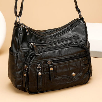 Spacious Multi-Pocket Vegan Leather Crossbody Bag - Chic Zipper Accents for Everyday
